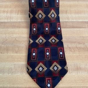 Preowned Men’s “ Leo” Brand Neck Tie. Multicolor. 100%Silk.